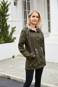 Detail of army green rain coat with adjustable drawstring hood and striped inner lining