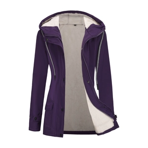 Detail of purple hooded windbreaker showing warm white fleece lining and dual closure design