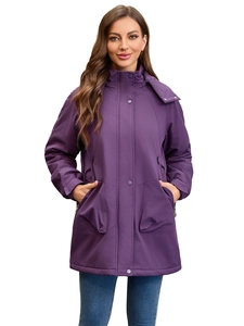 Detail showing purple waterproof hooded jacket with functional flap pockets and zip closure