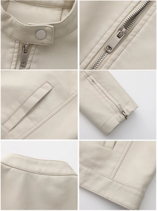 Detail view of cream faux leather jacket with metal zippers and stand collar stitching