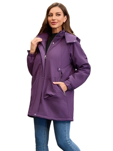 Detail view of purple women's winter parka with detachable hood and zip pockets