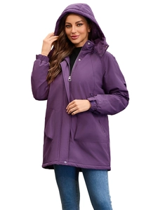 Detail view of purple hooded winter jacket with windproof fabric and large pockets