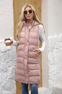 Detail of hooded quilted vest in dusty rose with silver snap buttons and warm padding