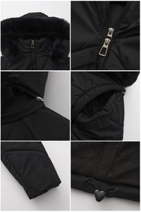 Detail view of winter jacket featuring faux fur hood, dual zipper and heart drawstring toggle