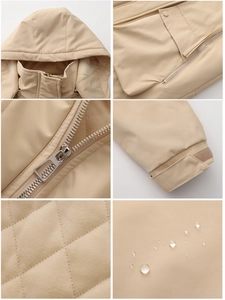 Detail showing waterproof beige parka with quilted lining and adjustable velcro cuffs