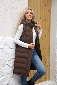 Detail of brown longline hooded vest with quilted padding and metal snap buttons