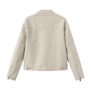 Detail view of cream faux leather jacket back with metal buckles and zipper cuffs