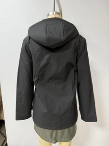 Back view of a black hooded windbreaker jacket with waterproof polyester fabric details