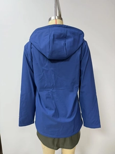 Rear view of a blue hooded windbreaker jacket with premium water-resistant fabric details