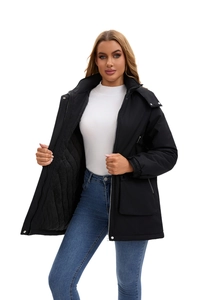 Detail of waterproof winter parka featuring quilted inner lining and adjustable cuffs