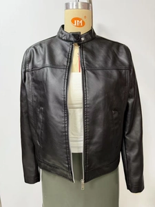 Detail of a black faux leather jacket featuring a stand collar and silver metal zipper
