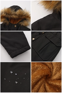 Détails du tissu imperméable d'une parka noire avec doublure polaire et col en fourrure