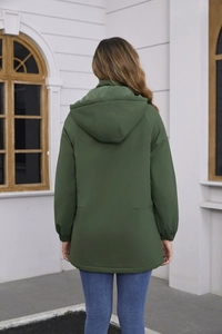 Back view of a dark green hooded jacket for women with raglan sleeves and windproof fabric