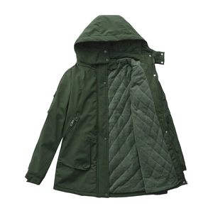 Detail of dark green waterproof parka showing quilted diamond lining and secure pockets
