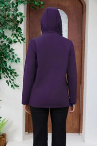 Rear view of a dark purple women's hooded windbreaker with a slim fit and casual style