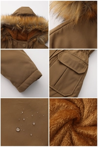 Détails de la parka d'hiver : tissu imperméable, col en fourrure et doublure polaire