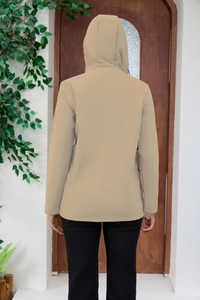 Rear view of khaki hooded windbreaker with waterproof fabric and casual fit design