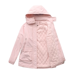 Detail of pink padded parka showing inner diamond quilting, zipper closure and hood