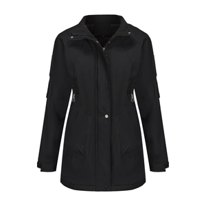 Detail view of black waterproof outdoor jacket showing adjustable cuffs and zipper pockets