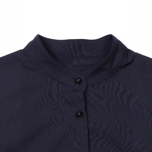 Detail of mandarin collar and buttons on a navy blue long-sleeve casual jacket