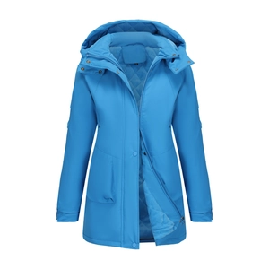 Detail of the inner light blue diamond quilted lining and zipper on the blue parka coat