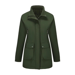 Detail of dark green women's waterproof jacket featuring pockets and storm flap
