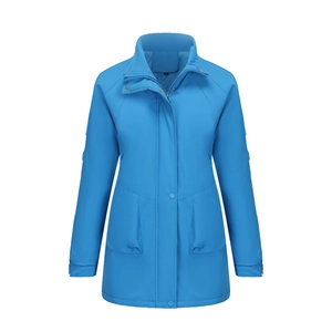 Detail view of a waterproof blue hooded jacket with snap buttons and large flap pockets