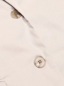 Beige loose suit vest for women featuring high-quality twill fabric and amber buttons