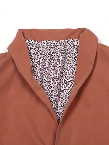 Brown women's blazer with classic leopard print lining and elegant notched lapel details