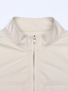 Front view of a beige high-collar zip-up jacket made of windproof synthetic fabric