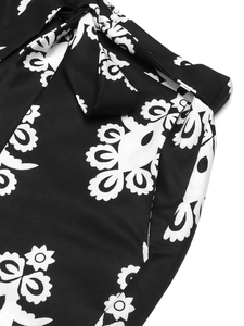 Casual black and white floral print shorts with waist tie and side pockets for women