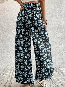 Pantalon large à taille haute pour femme avec imprimé floral bleu et blanc sur noir