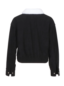 Back view of a black corduroy jacket with white faux fur collar and lantern sleeves