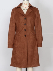 Close-up of caramel faux suede long coat with single-breasted buttons and side pockets