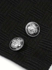 Women's black cropped knit jacket with textured plaid pattern and vintage silver buttons