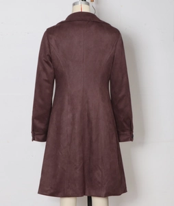 Back view of a burgundy suede midi coat featuring slimming waist seams and cuff buttons