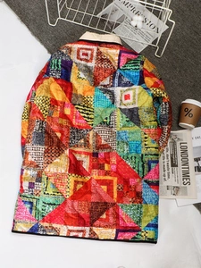 Women's padded cotton jacket with vibrant patchwork geometric patterns and high collar