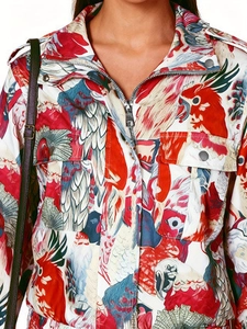 Women's floral bomber jacket with parrot print, metal zipper, and shoulder epaulettes