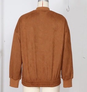 Detailed back view of brown suede jacket with dropped shoulders and ribbed hem