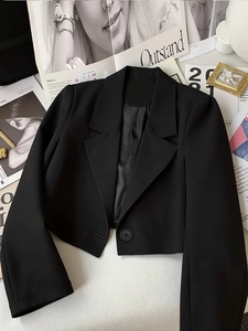 Chic black cropped blazer with puff sleeves and single-button closure for women