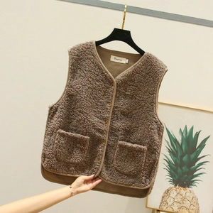 Detailed view of brown lamb wool vest with V-neck, retro buttons and large front pockets