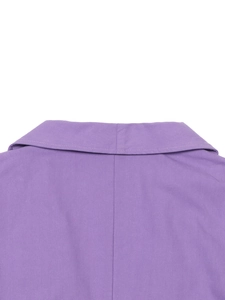 Close-up of the notched lapel and neat stitching on a purple linen blazer for women