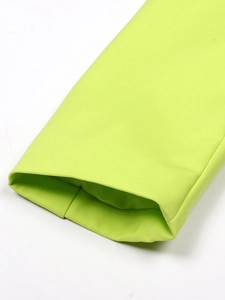Close-up of sleeve cuff on a slim-fit double-breasted neon green blazer for women