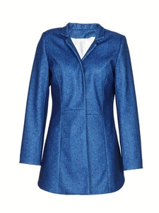 Detailed close-up of blue blazer featuring herringbone knit texture and notched lapels