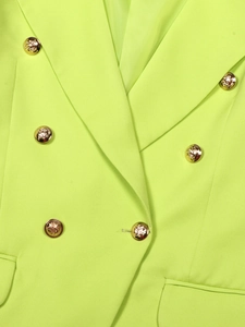 Women's double-breasted suit jacket in lime green with gold lion head buttons