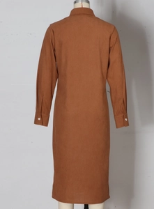 Detail of caramel corduroy dress back with shirt collar and white button cuffs