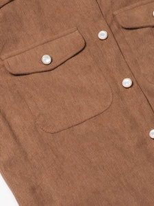 Brown corduroy shirt jacket with chest pockets and pearl buttons for women