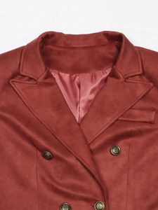 Close-up of brick red faux suede blazer featuring notch lapels and gold embossed buttons