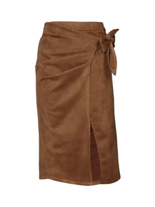 Detail of brown faux suede wrap skirt showing side knot bow and stylish thigh-high slit
