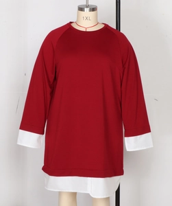 Close-up of a plus-size dark red tunic with 2-in-1 layered white shirt collar and cuffs